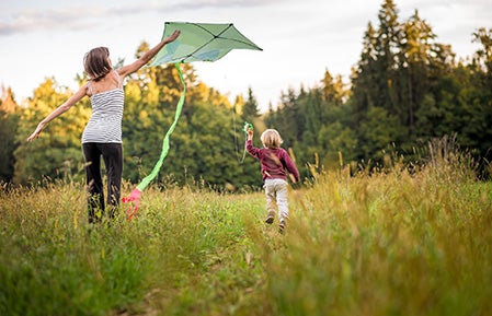 kids-in-field-with-kite
