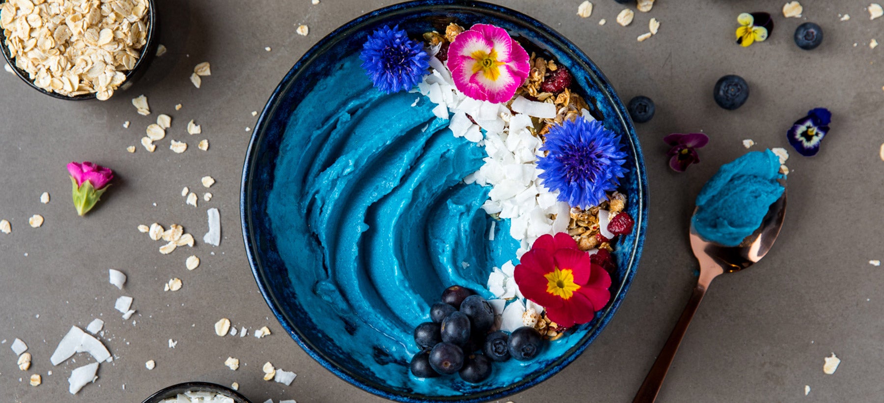 blue-oat-smoothie-bowl-decorated-with-flowers