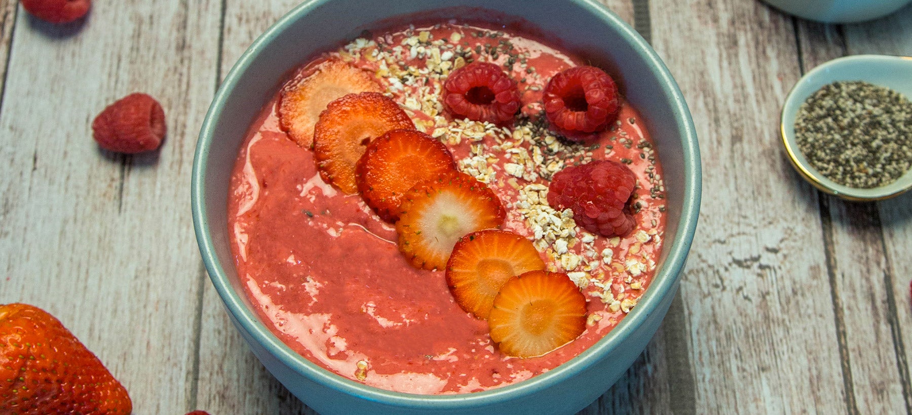 pink-smoothie-bowl-decorated-with-fruit